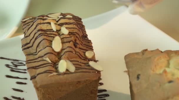 Cakes and Pastries, decorating with a chocolate — Stock Video