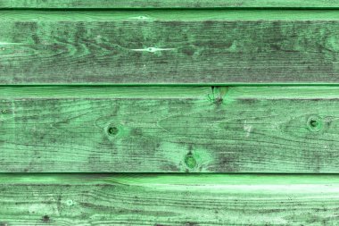 Doğal desenli eski yeşil ahşap doku.
