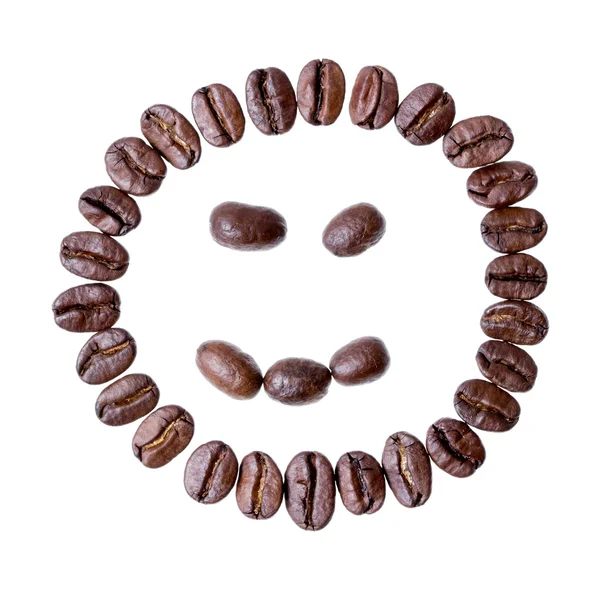 Visage de grains de café isolés sur un fond blanc — Photo