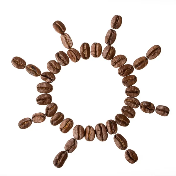 Sun from coffee beans isolated on a white background — Stock Photo, Image