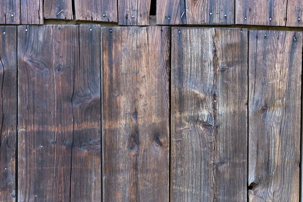 La vecchia struttura in legno con motivi naturali — Foto Stock