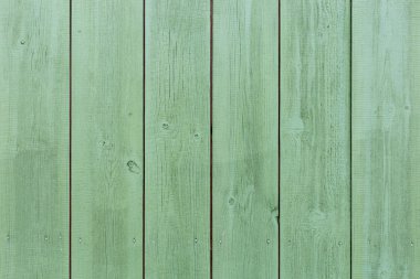 Doğal desenli eski yeşil ahşap doku.