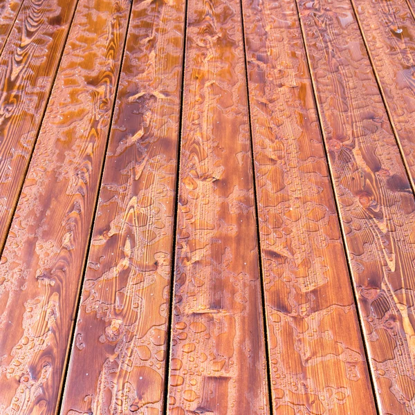 Abstrakt regndroppar mönster på träplatta. bakgrund. — Stockfoto