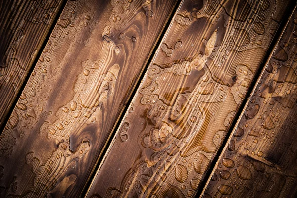 soyut yağmur damlaları desen ahşap tahta üzerinde. arka plan.