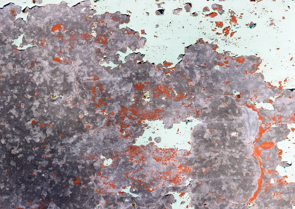 The cracked paint on an old metallic surface — Stock Photo, Image