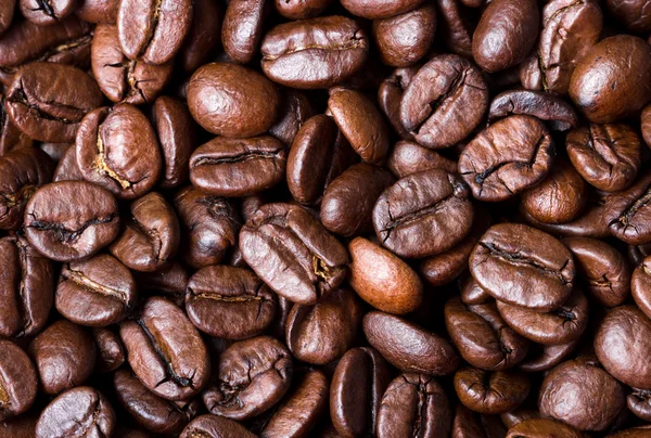 Des grains de café. Macro close up pour le fond et la texture — Photo