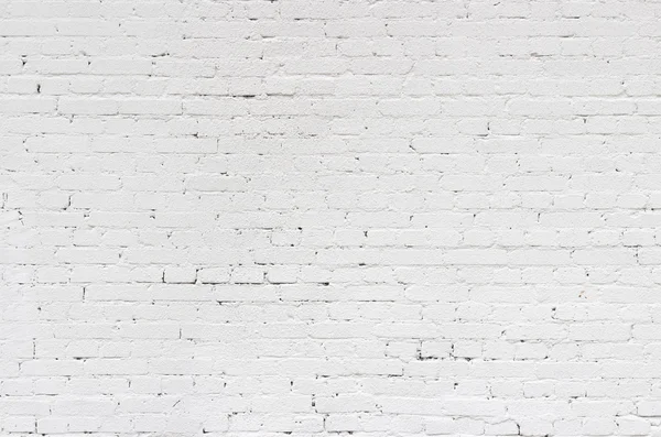 Bakgrund konsistens av en gammal vit tegelvägg — Stockfoto