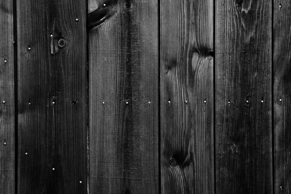 Vecchia parete di legno verniciato nero - texture o sfondo — Foto Stock