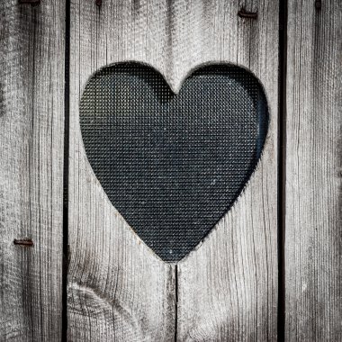 ahşap kapı kalp ile. arka plan