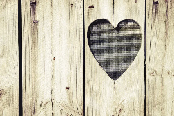 The wooden door with heart. Background Stock Photo