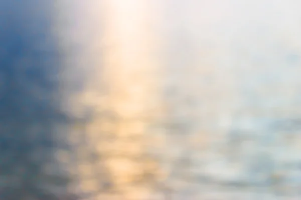 Blurred scene sea water at sunset for background — Stock Photo, Image