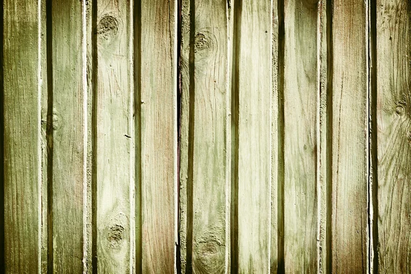 Pared de madera pintada antigua - textura o fondo — Foto de Stock