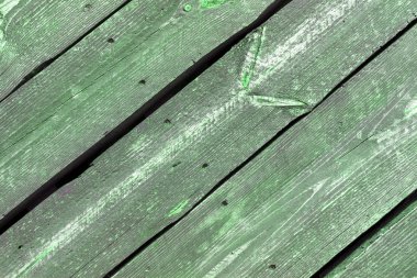 Doğal desenli eski yeşil ahşap doku.