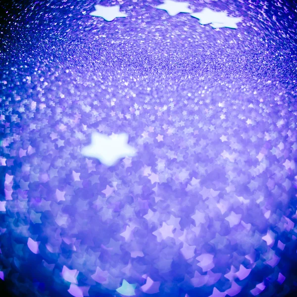 Fondo navideño festivo con estrellas. Brillo destellado abstracto —  Fotos de Stock