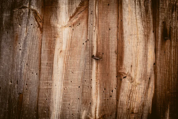 La vecchia struttura in legno con motivi naturali — Foto Stock