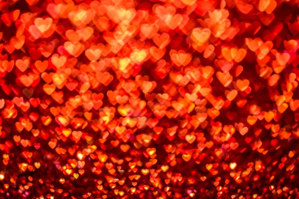 Rood hart bokeh achtergrond. De dag van Valentijnskaarten textuur. — Stockfoto