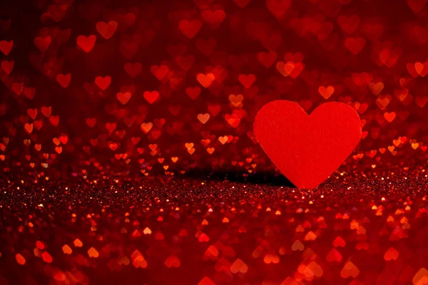 Rood hart bokeh achtergrond. De dag van Valentijnskaarten textuur. — Stockfoto