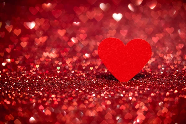 Corazón rojo fondo bokeh. Textura de San Valentín . — Foto de Stock