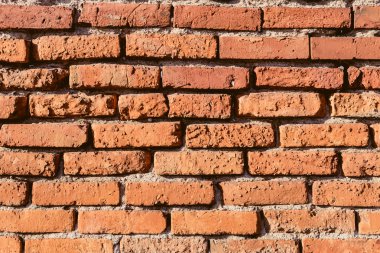 Kırmızı tuğla duvar deseninin arkaplanı.
