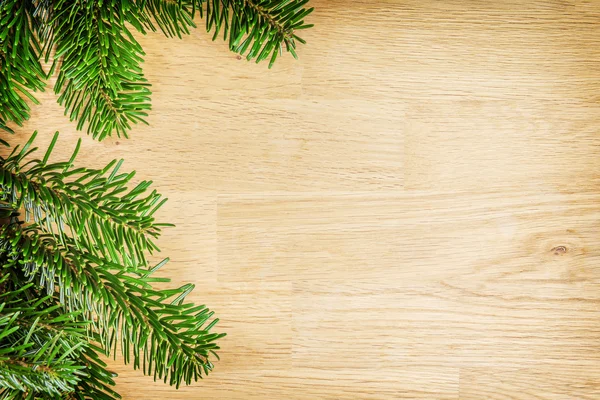 Ramas sobre fondo de madera — Foto de Stock