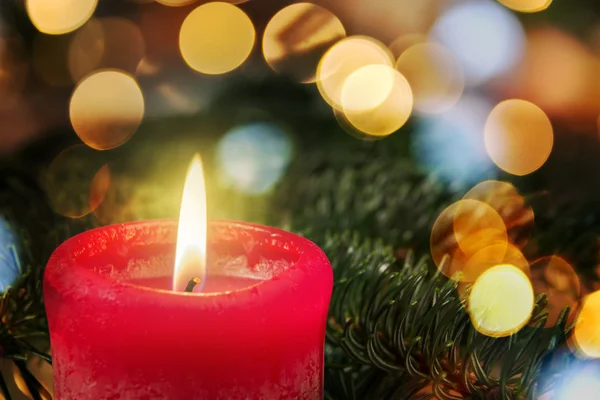 Red candle with branch — Stock Photo, Image