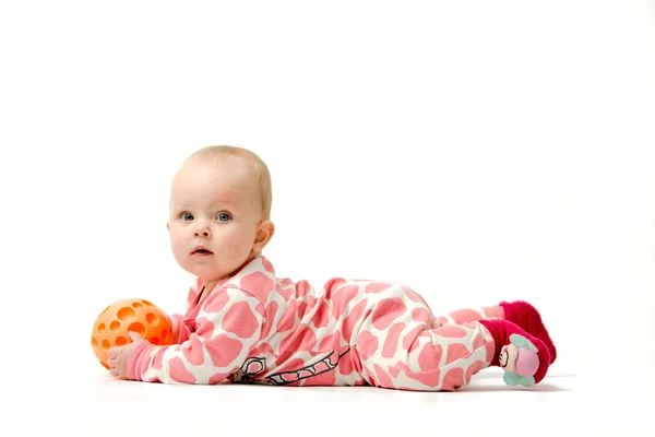 Little girl playing with a ball — Stock Photo, Image