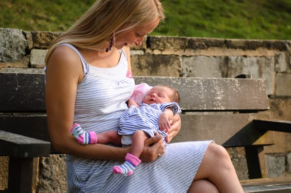 Young mother and a baby girl — Stock Photo, Image