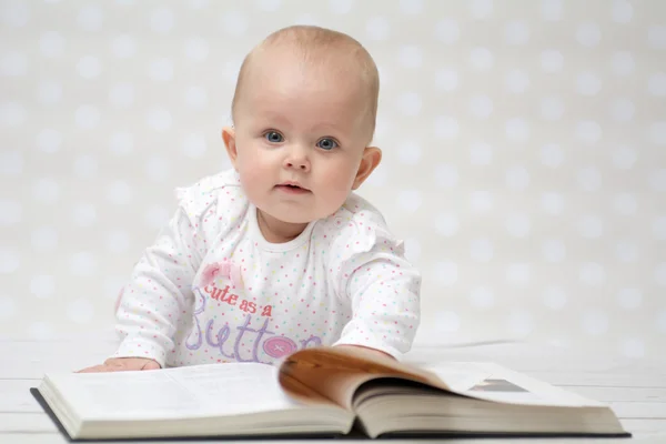 Baby with the book — Stock Photo, Image
