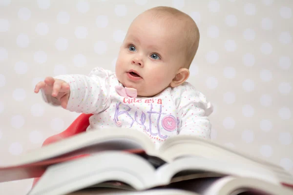 Baby with books — Stock Photo, Image