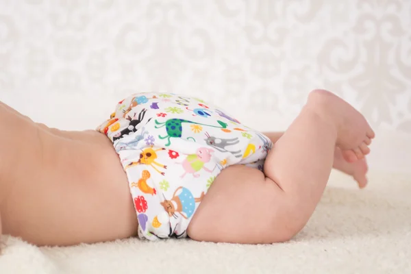 Baby wearing a reusable nappy — Stock Photo, Image