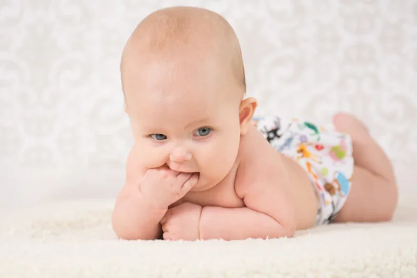 Baby wearing a reusable nappy — Stock Photo, Image