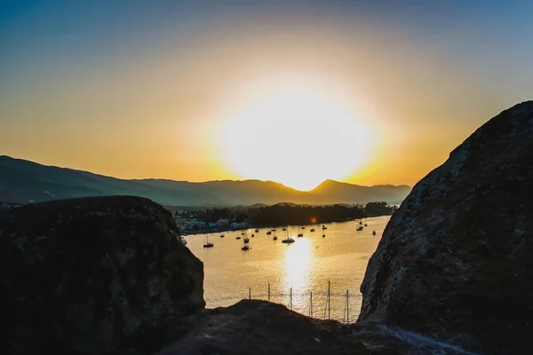 Coast of Paros island in Greece view from above in the sunset out of focus — стоковое фото