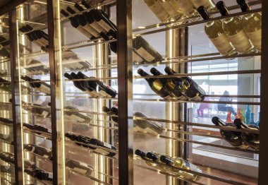 Elegant wine storage refrigerator with glass doors clipart