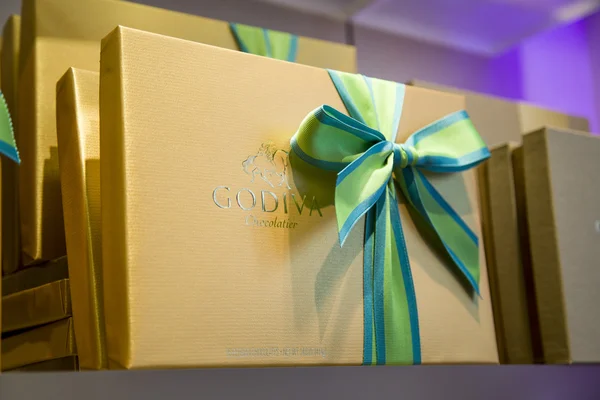 Chocolates in gift boxes on a shelf — Stock Photo, Image