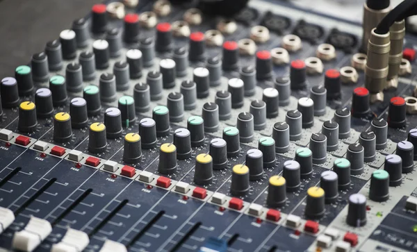 Sound console with colorful equalizer levels dials — Stock Photo, Image