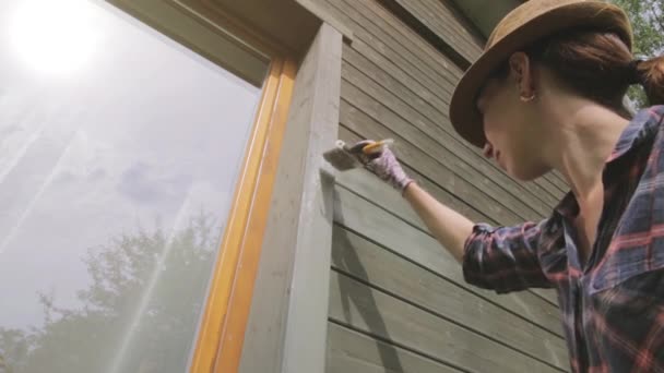 Woman Worker Painting Wooden House Exterior Wall Paintbrush Wood Protective — Stock Video