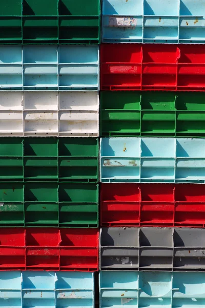 Colorful crates for fish stacked — Stock Photo, Image