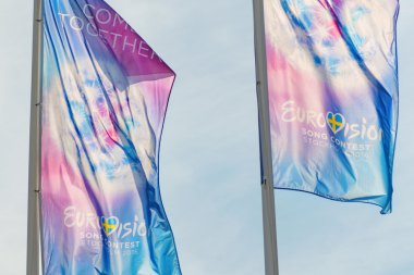 Closeup of the Come together flags at Eurovision Song Contest ou clipart