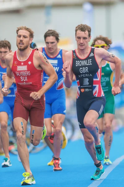 Alistair Brownlee in a group at the transition to running at the — Stock Photo, Image