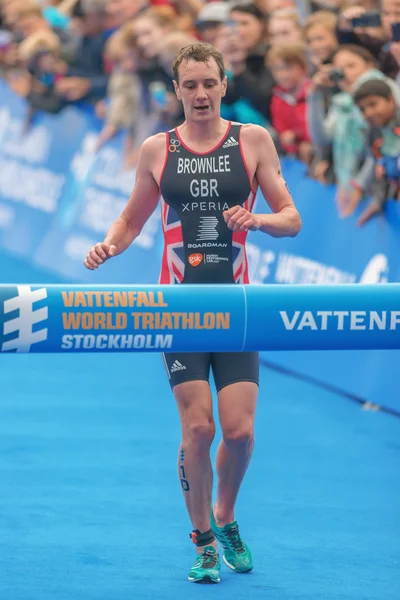 Winner Alistair Brownlee running to the finish line at the Mens — Stock Photo, Image