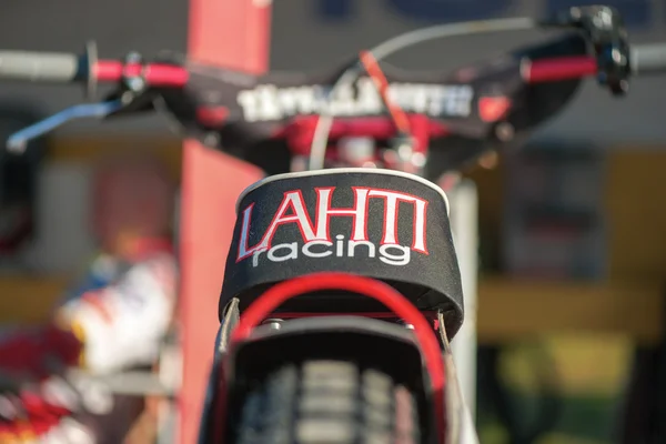 Closeup of the bike of Timo Lahti at the speedway racing between — Stock Photo, Image