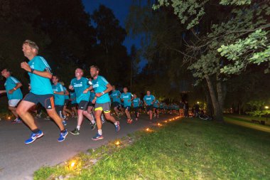 Stockholm'de Gece yarısı çalıştırmak runners (Midnattsloppet)