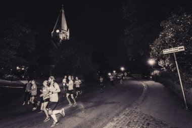 Stockholm'de Gece yarısı çalıştırmak runners (Midnattsloppet)