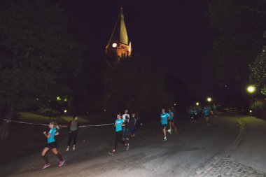 Stockholm'de Gece yarısı çalıştırmak runners (Midnattsloppet)