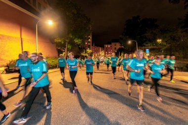 Stockholm'de Gece yarısı çalıştırmak runners (Midnattsloppet)