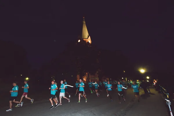 Runners at the Midnight run in Stockholm (Midnattsloppet) — Stock Photo, Image