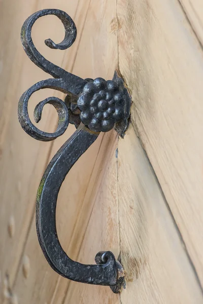 Ornamented door handle from old times — Stock Photo, Image