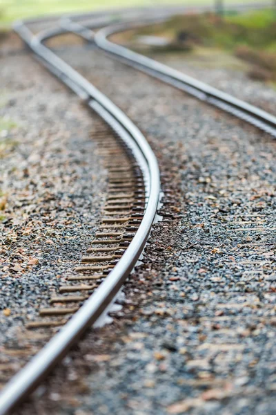 Detail van bochtige railroad tracks — Stockfoto