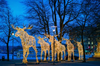 Group of Mooses made with light at Nybrokajen in Stockholm clipart