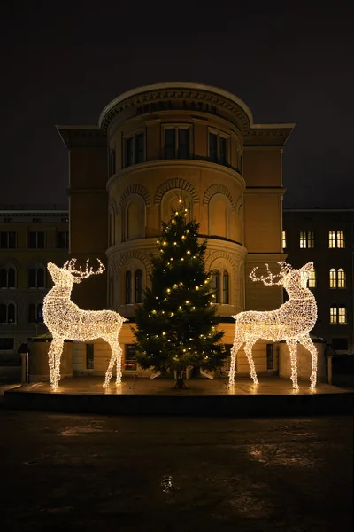 Two raindeers and a christmas tree with light at Norra Bantorget — Stock Photo, Image